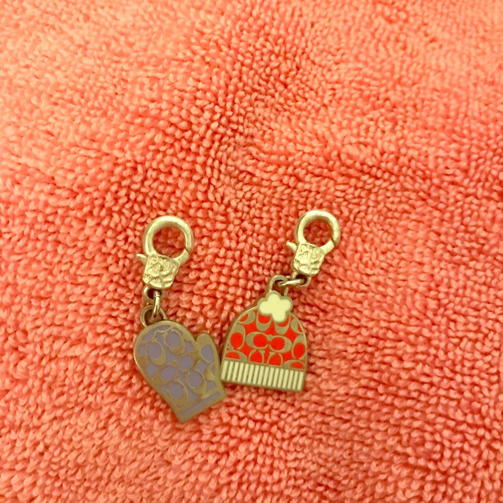 Two coach charms